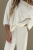 mela off white.jpeg